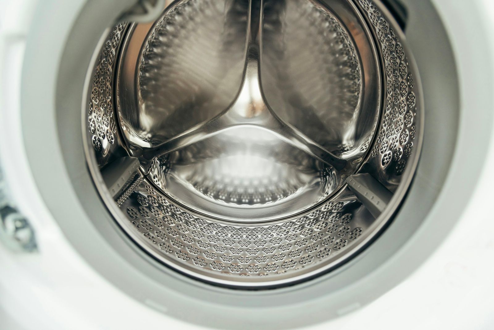 Looking into the steel drum of a front-loading washer