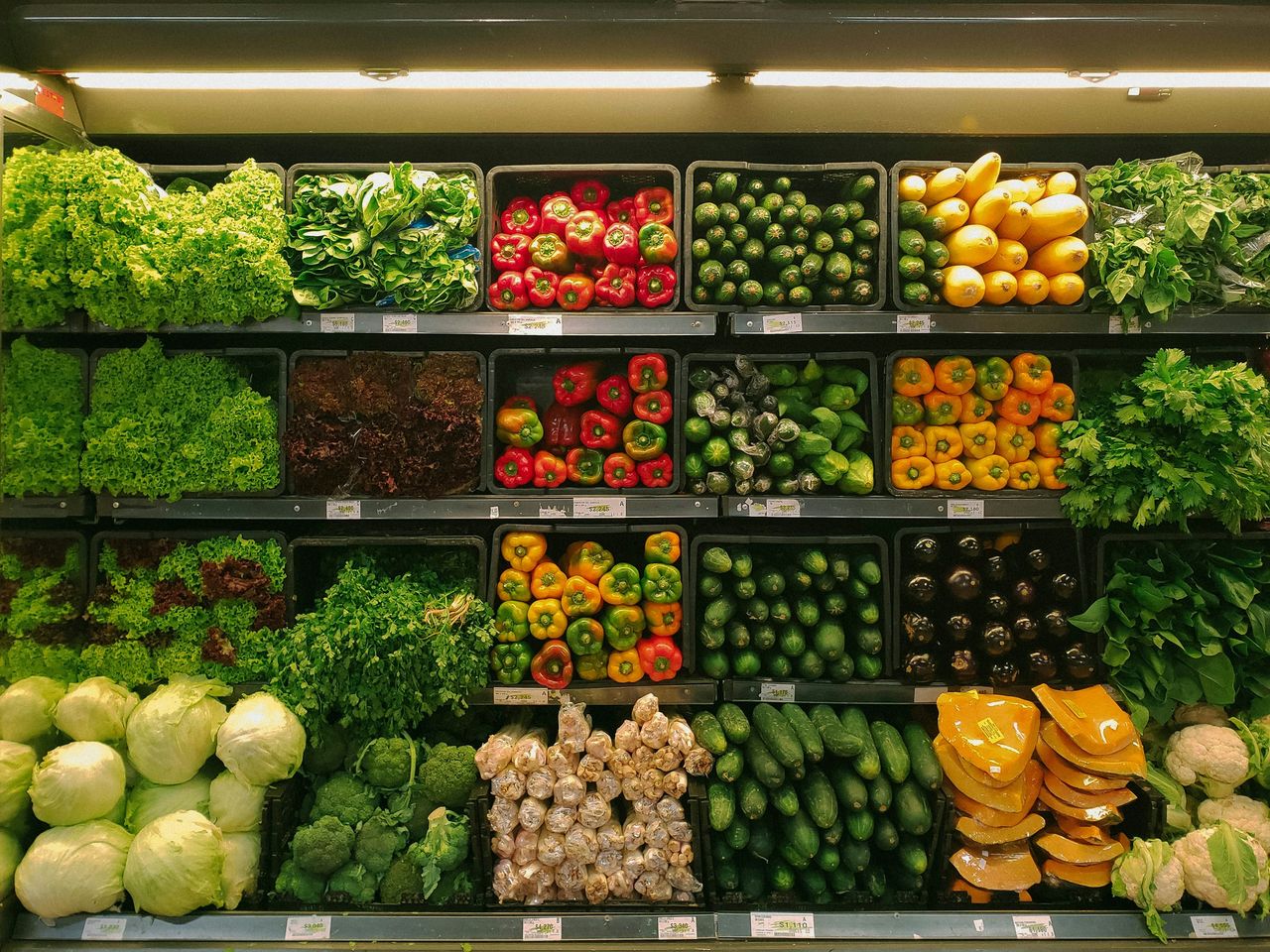 Shelves of fresh vegetables and peppers